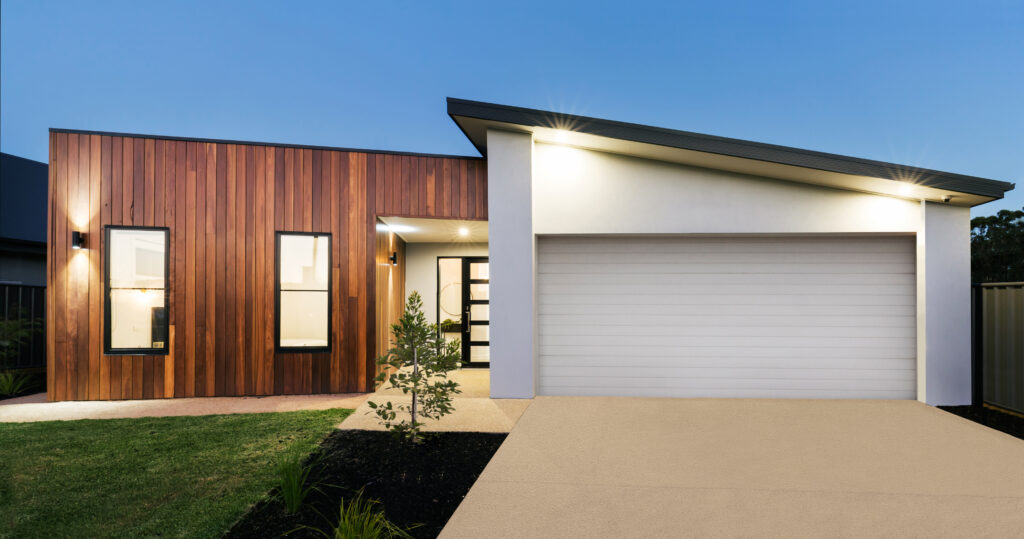 Contemporary new Australian home and lighting at dusk